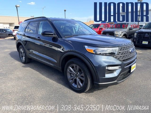 2024 Ford Explorer XLT in Blue Metallic — front three-quarter view