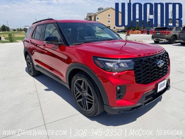 2026 Ford Explorer ST in Rapid Red Metallic Tinted Clearcoat — front three-quarter view